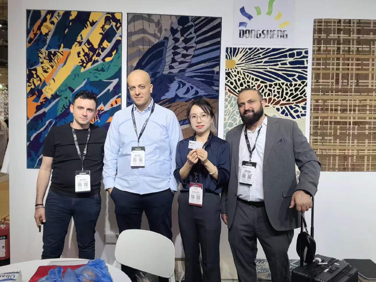 Dongsheng Carpet Team with Customers at the Exhibition Dongsheng Carpet Team with Customers at the Exhibition